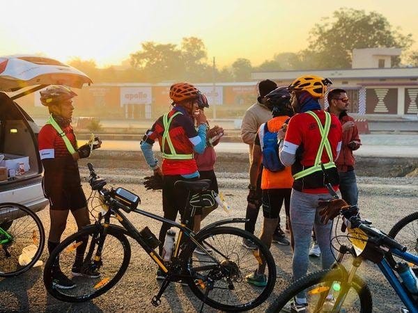 Riders at dawn before a brevet