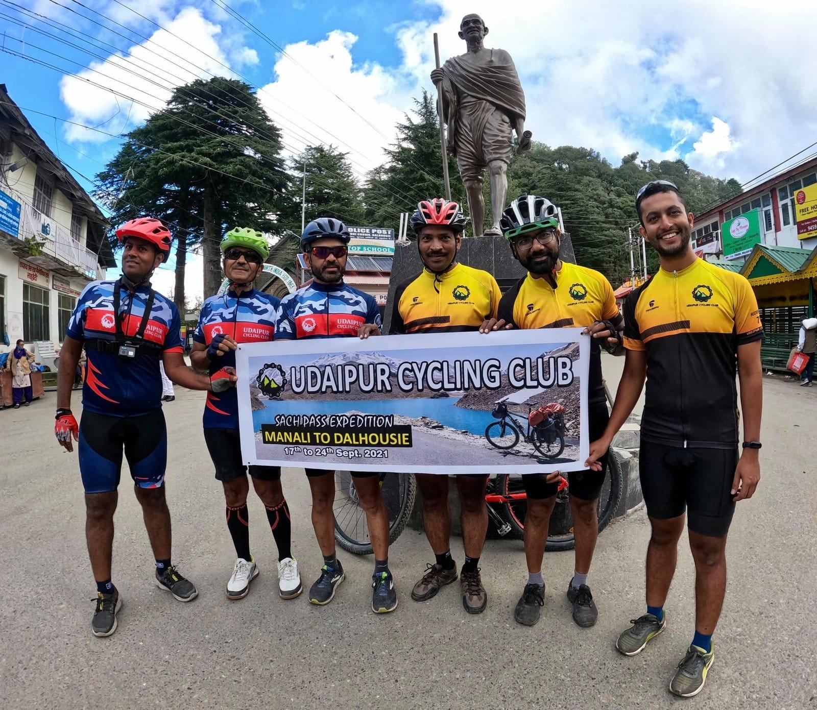 UCC team with a banner on the Sach Pass expedition